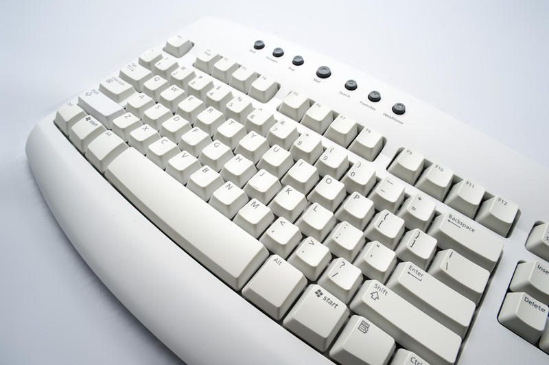 wide angle image of a beige computer keyboard