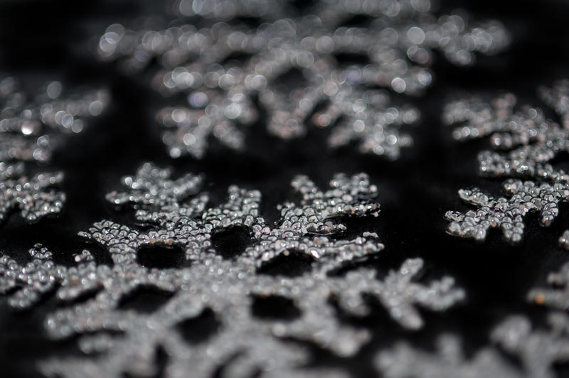 a background image of christmas snowflake shaped decorations