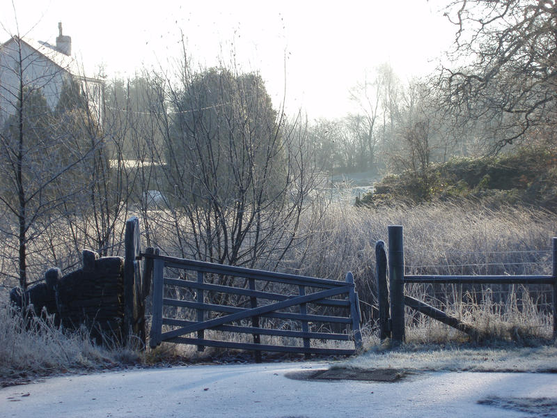 a old broken down wooden gate