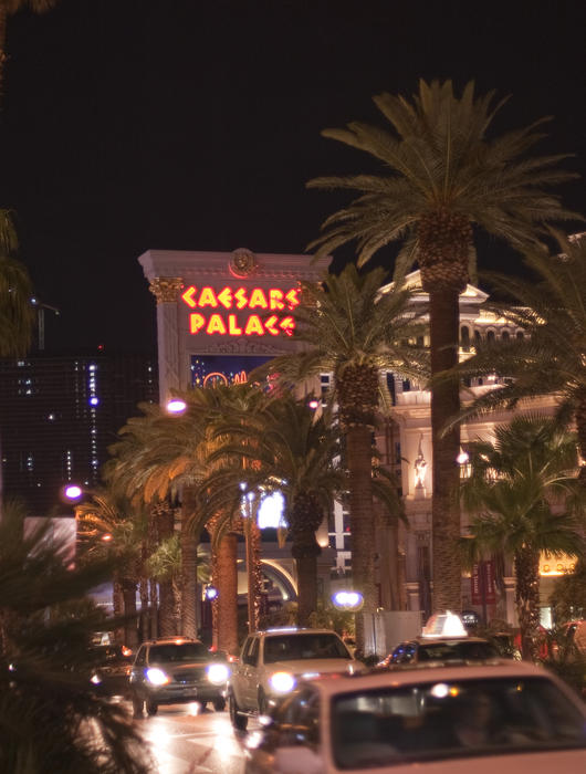 editorial use only: caesars palace sign at night