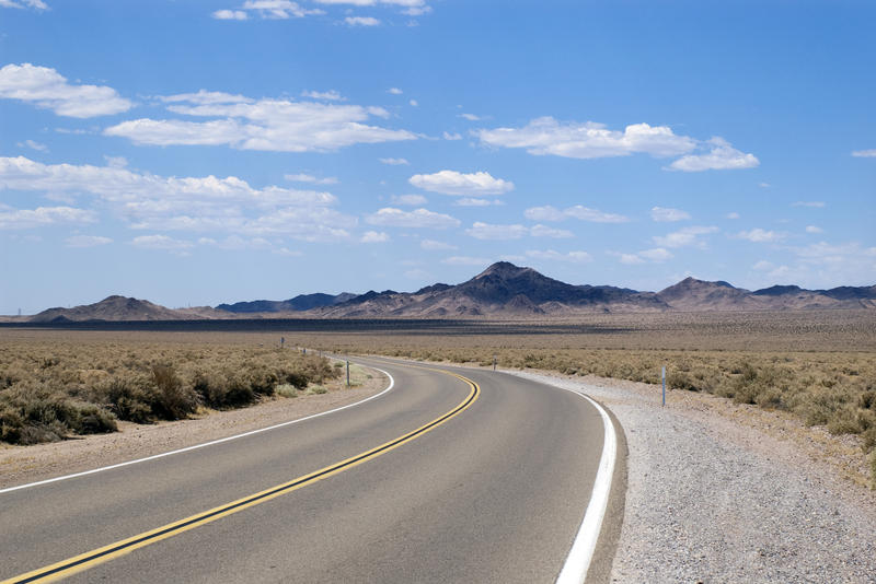 on the road again: a scenic landscape from a drive through the california desert