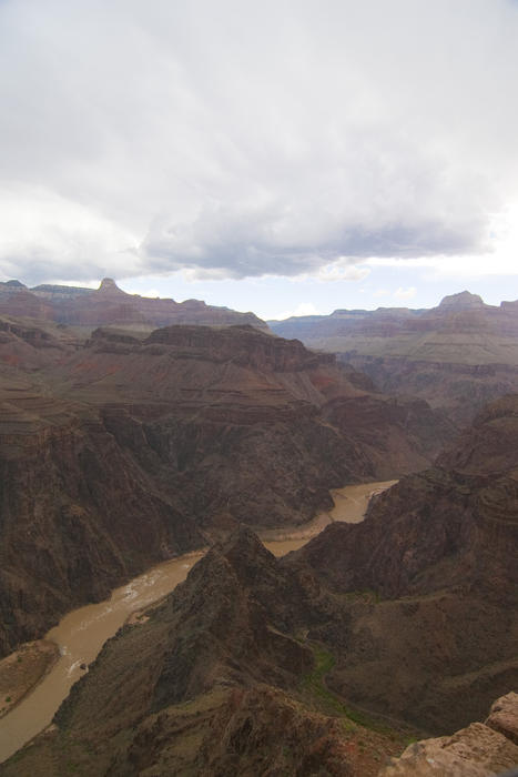 heavy rain clouds of a rugged mountain landscape