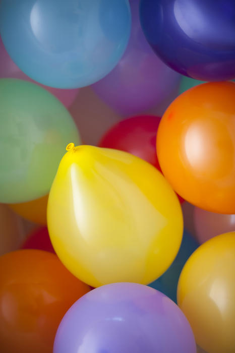 an arrangement of inflated rubber balloons of various colors