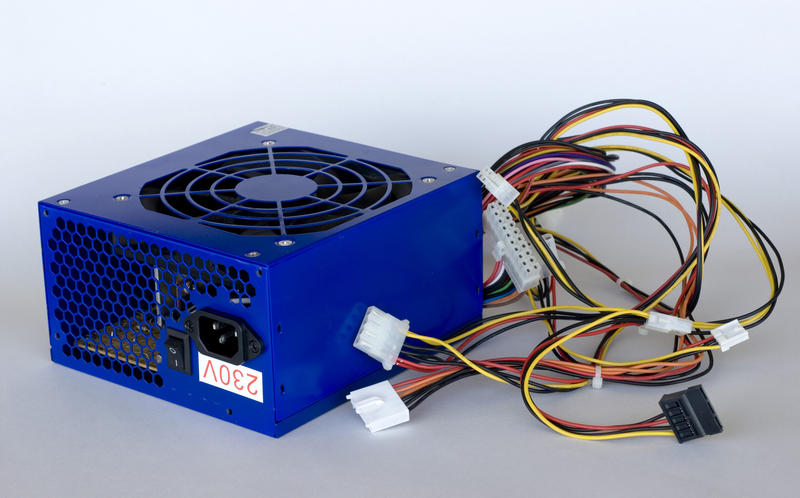 a computer power supply from inside a desktop or tower PC case
