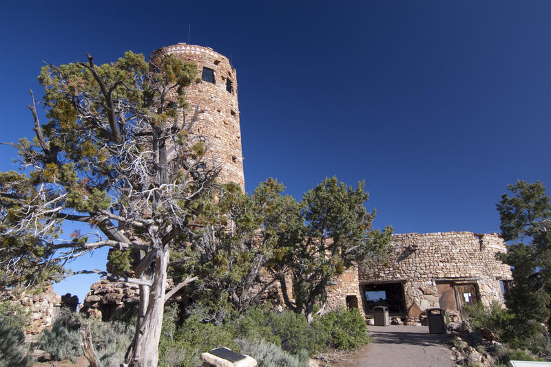 the desert watch tower looks out from the south rim of the grand canyon