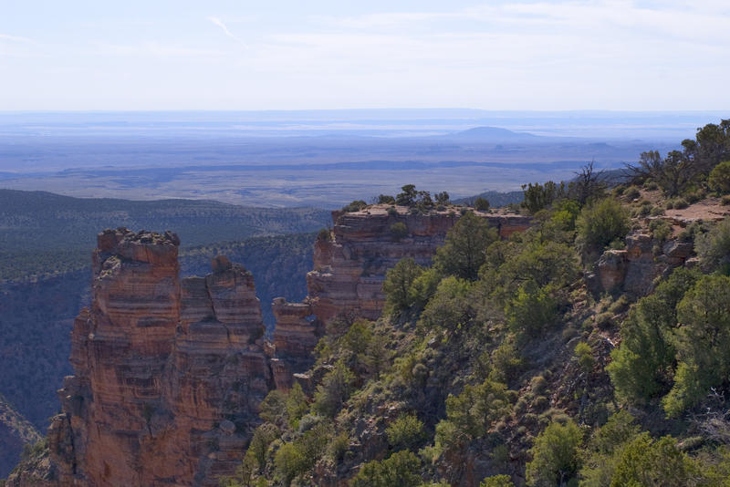 a rocky outcrop and distant desert horizon