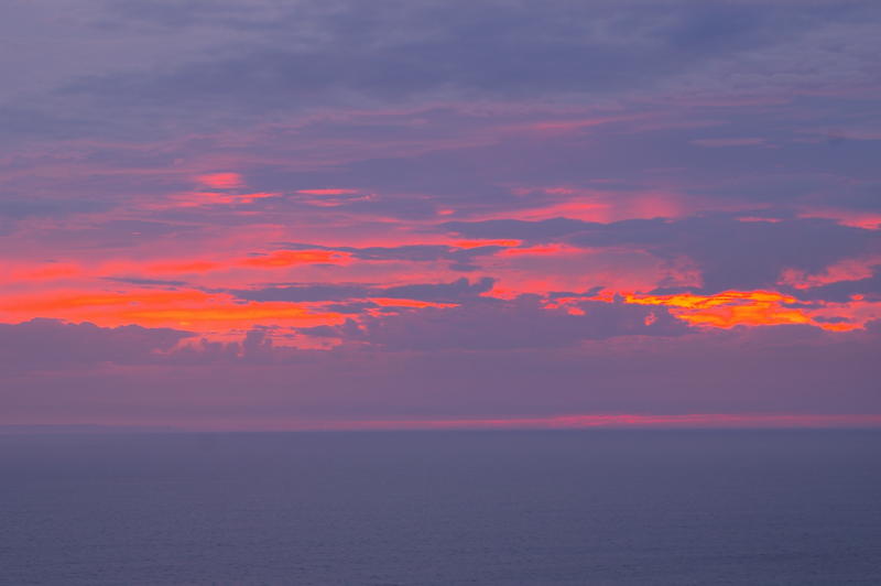 dusk sky glowing red with a beautiful vivid sunset