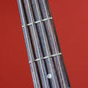 stock image 4008-guitar strings on red