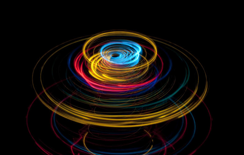 a background image of eliptical light trails