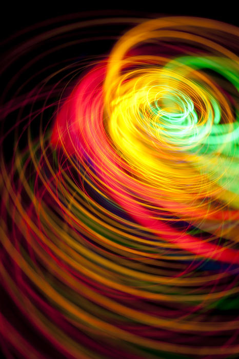 a vivid and flamboyant image featuring colorful spiraling lines of multicloured lights
