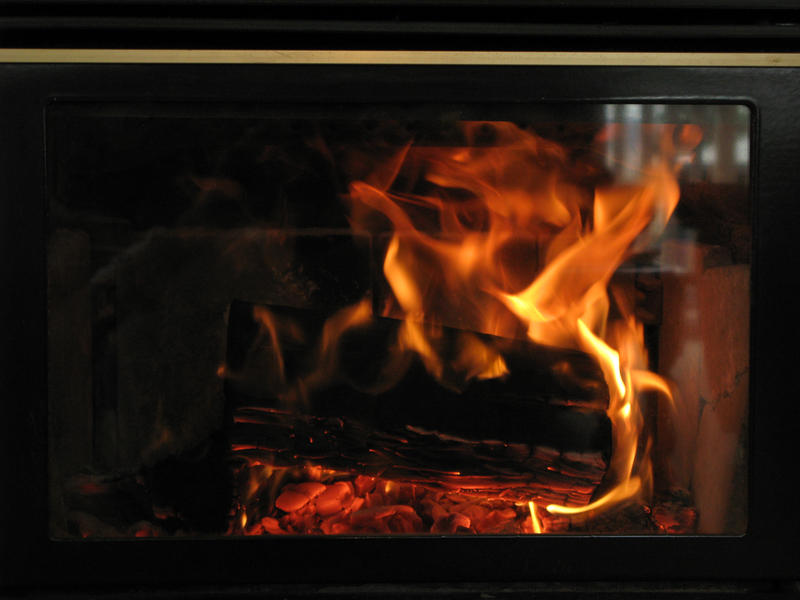 logs on a wood burning stove