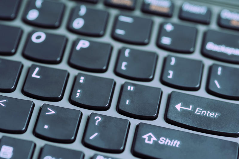 a cross processed effect image of a keyboard on a netbook computer