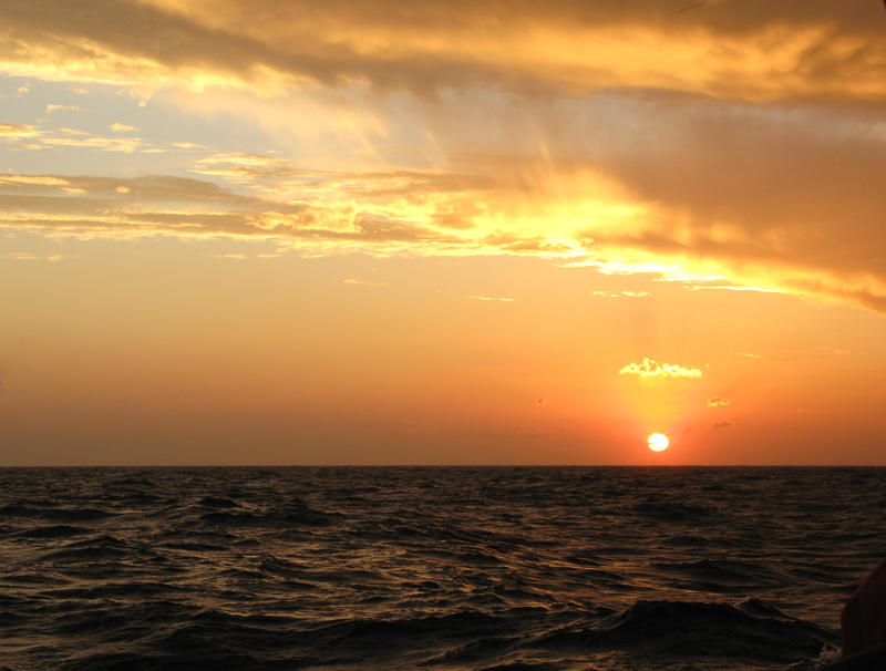 sunset lighting up a cloudy sky