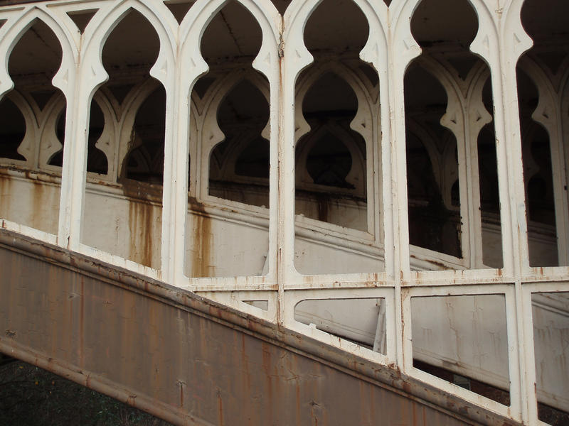 close up on cast iron details of a railway viaduct in manchester castlefields