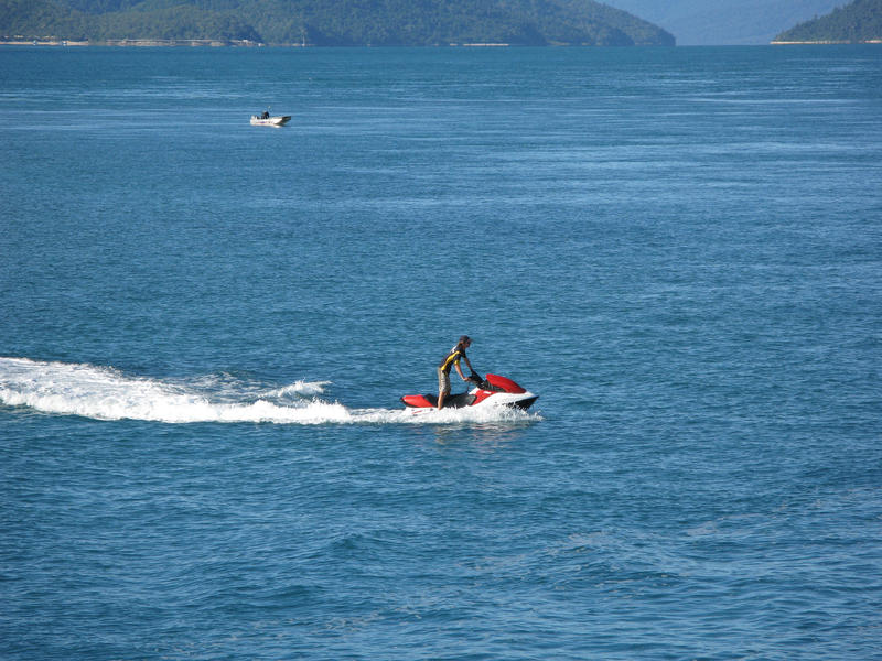 a man riding a jetski