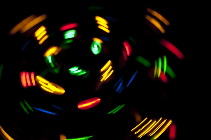 colourful arcs of light with a rotational blur