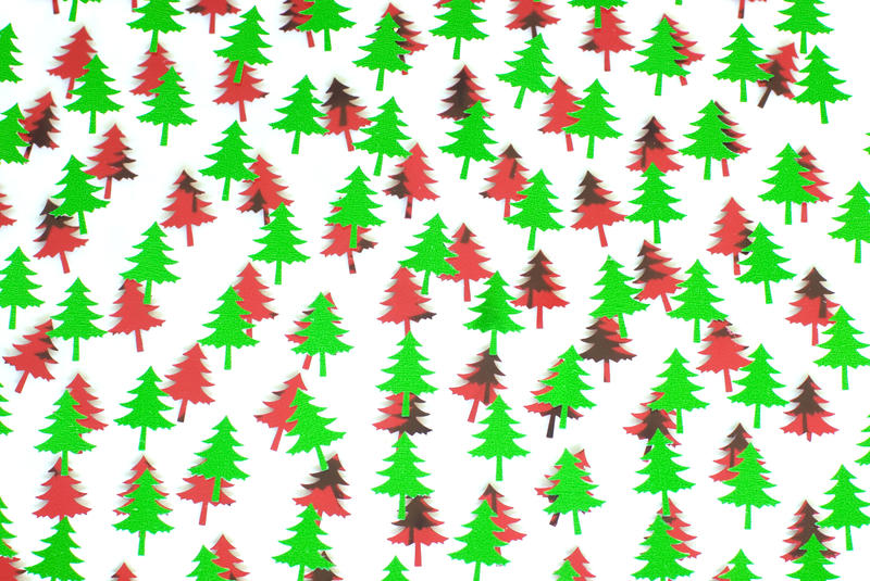 a background of red and green christmas tree shapes