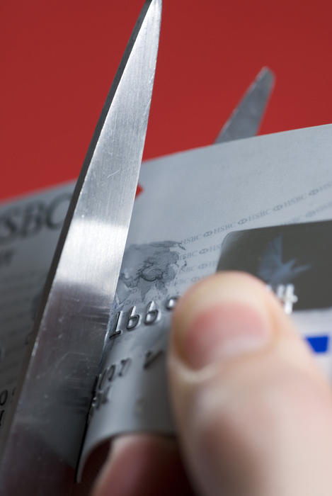 concept: stopping spending on a credit card to reduce debit