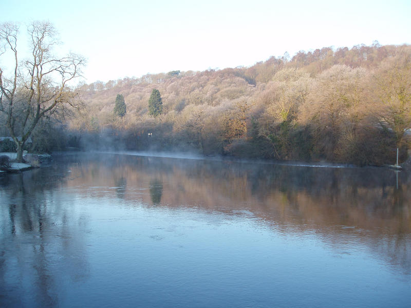 looking downstream towads the weir on the river leven at newby bridge