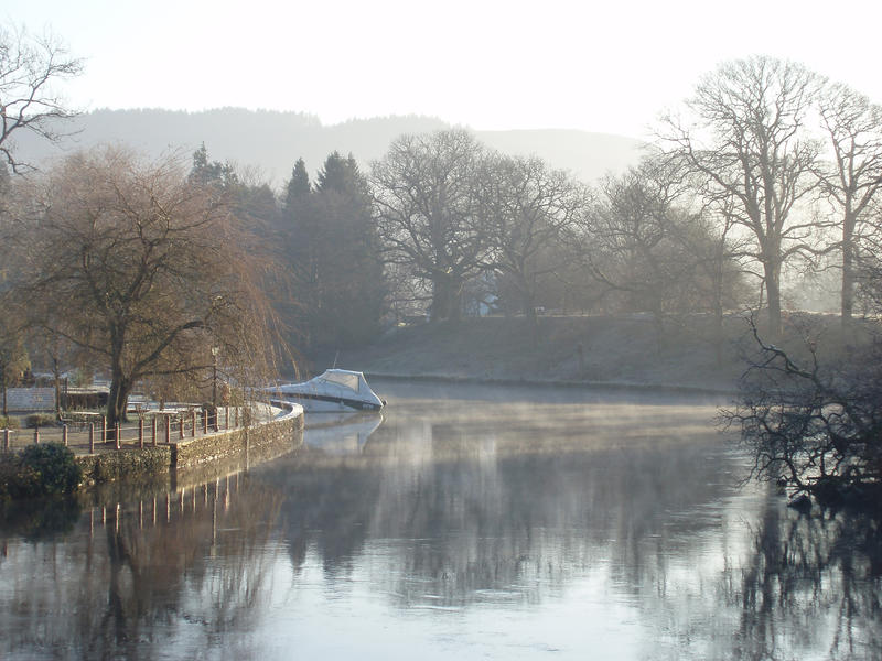 a cold winter morning looking out onto calm water