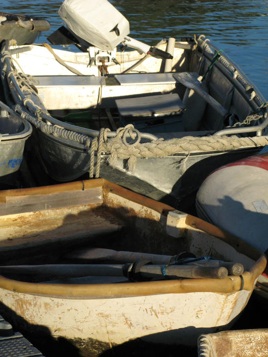 rowing boats tied up at a jetty