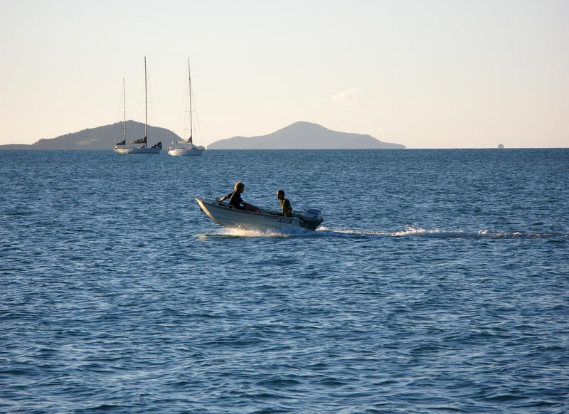 motoring along in a small fishing boat