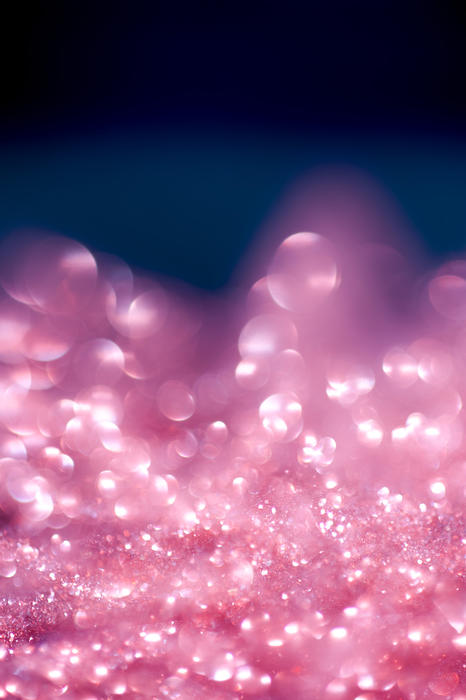 an ethereal looking pink glitter backdrop
