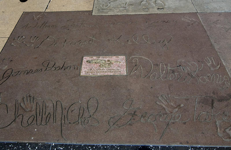 autographs and handprints of the stars of star trek on a pavement in hollywood