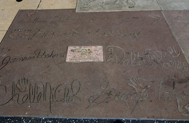 autographs and handprints of the stars of star trek on a pavement in hollywood