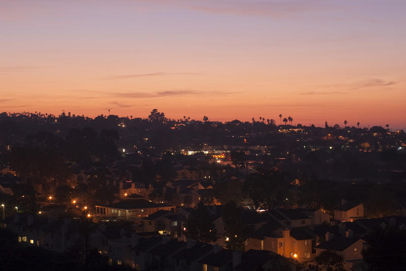 suburban california lit the with golden orange light of sunset