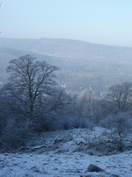 looking down at lake windermere from gummershow on a cold winter day