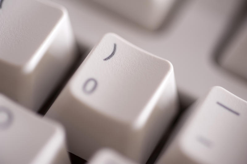 extreme close up on the zero key from a computer keyboard