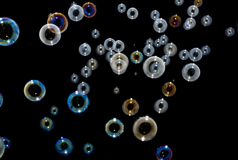 a backgrounds of soap bubbles on black