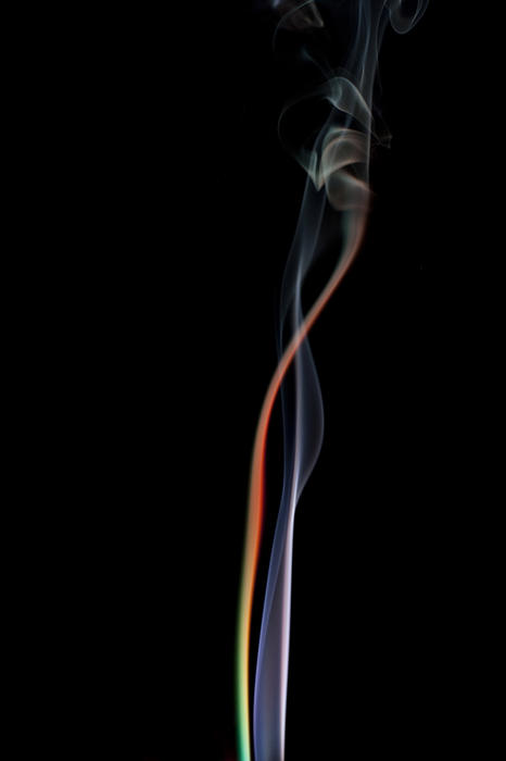 colorful background of twisting smoke trails