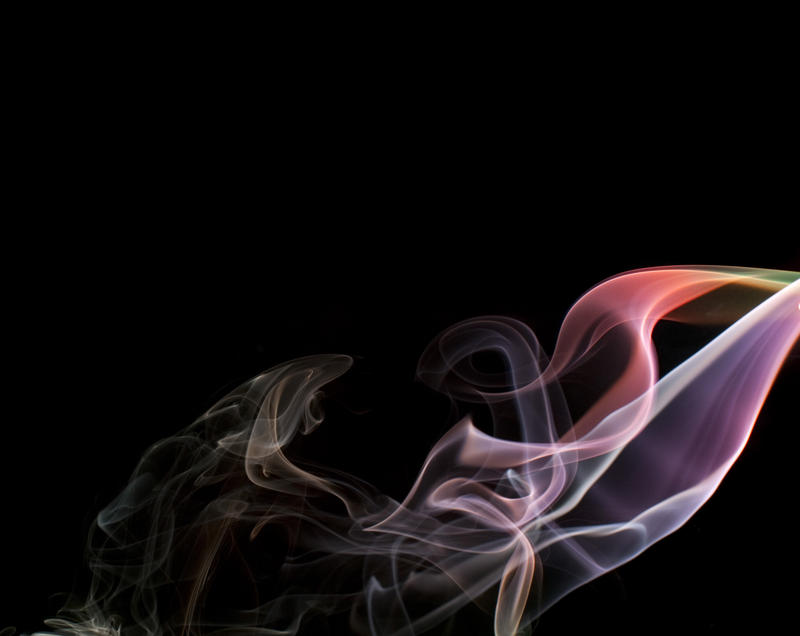 a defuse background of pastel coloured smoke