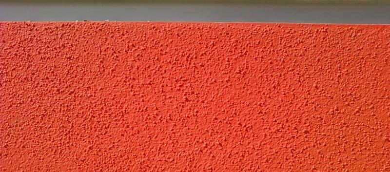 <p>Orange stucco background with gray strip&nbsp;</p>