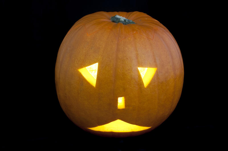 an unhappy pumpkin lantern carved face