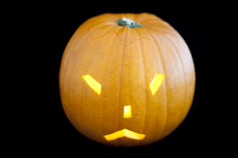 an illuminated halloween jackolantern or pumpkin lantern