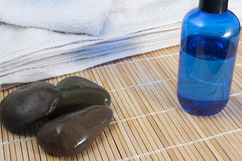 hot rock massage stones and hand massage oil
