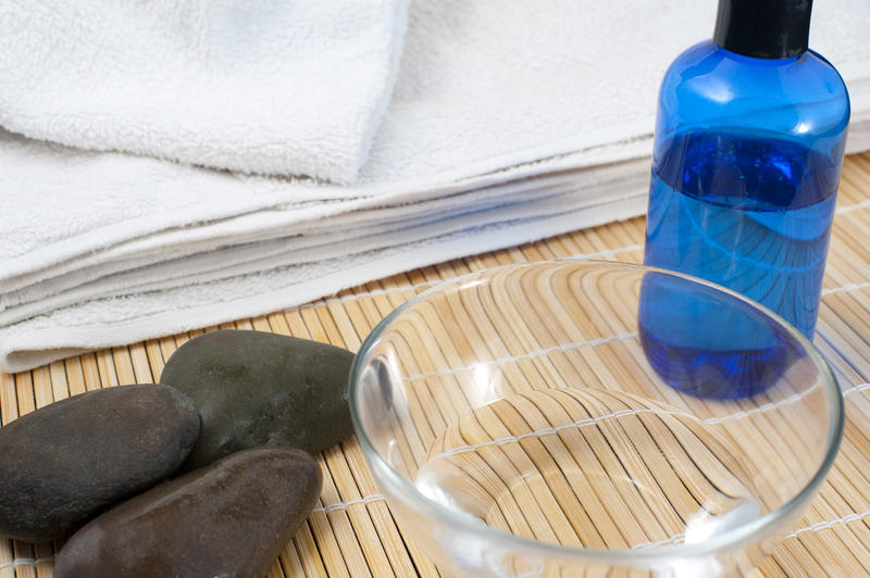 scented oil and hot rocks for a massage treatment