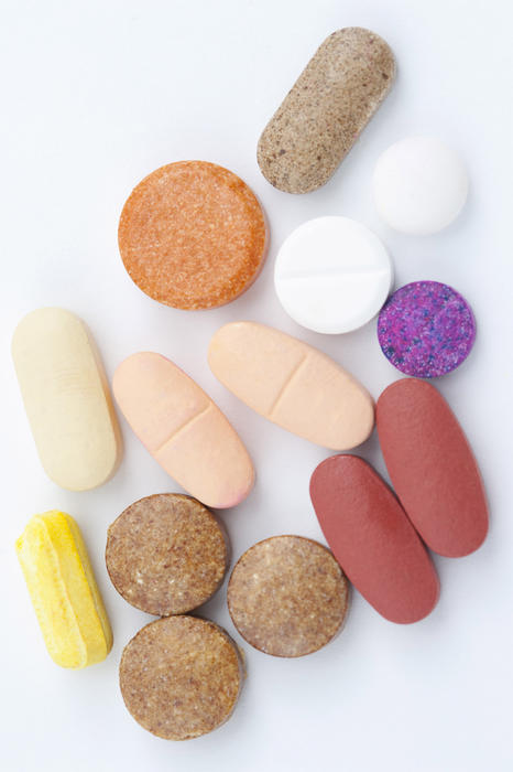 different types of tablet on a white backdrop