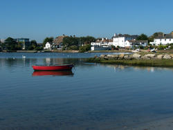4630   red dinghy at anchor