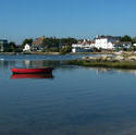 4630   red dinghy at anchor