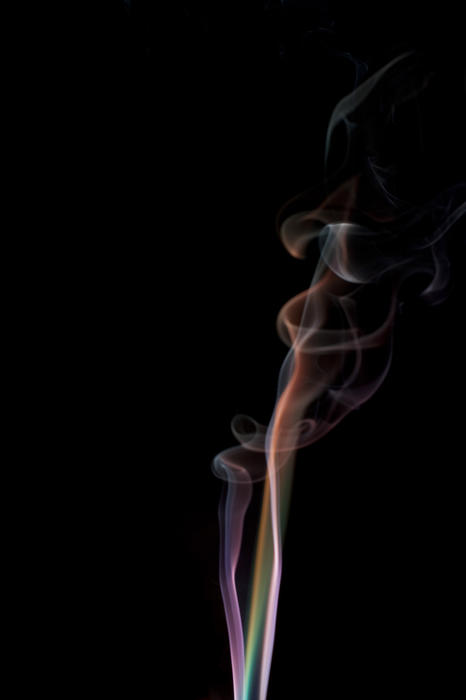 a plume of colorful swirling smoke trails