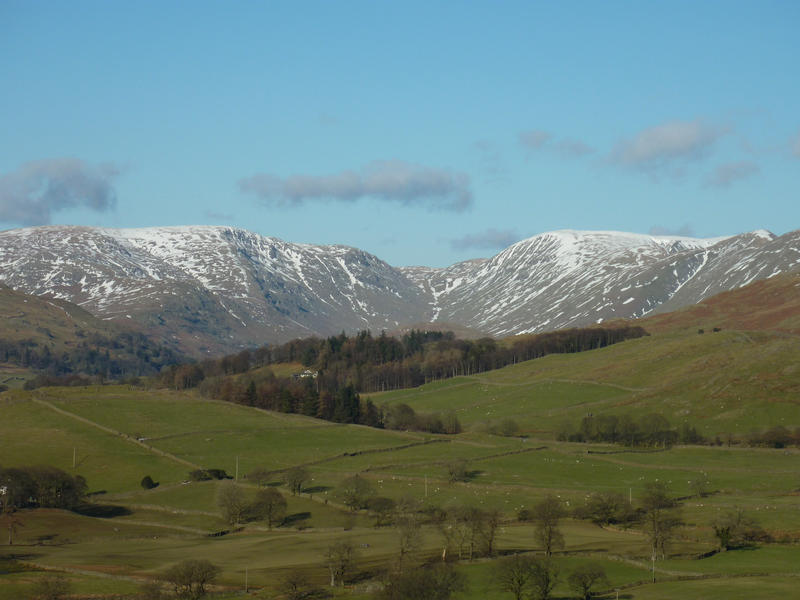 cumbrian fells with a dusting of winter snow