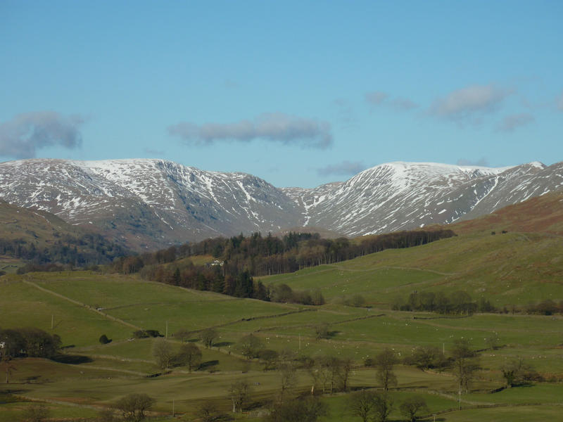 cumbrian fells with a dusting of winter snow