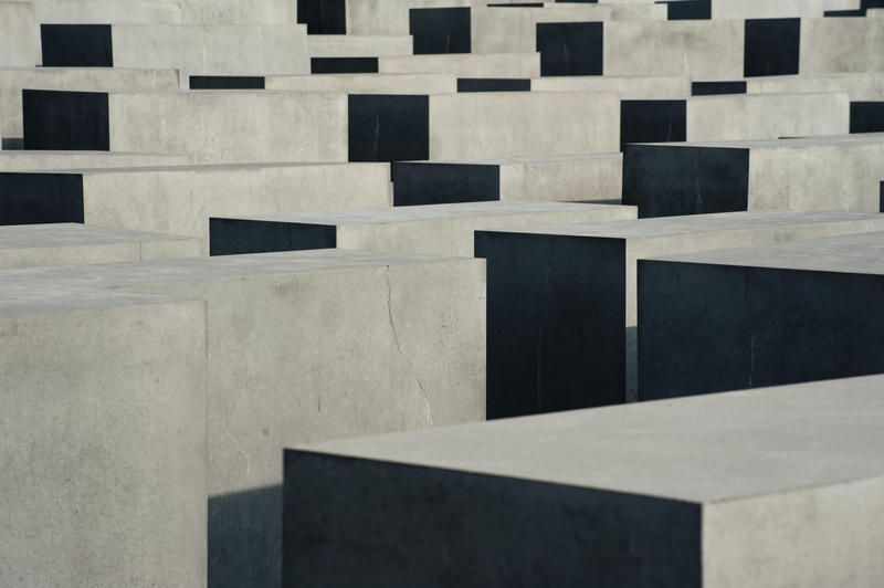 abstract images of light and shadows falling on the berlin holocuast memorail to be murdered jews of europe