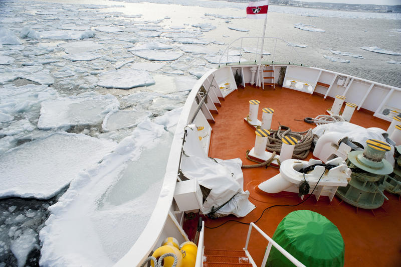 breaking through ice drifts of the northern cost of Hokkaido in winter, Japan