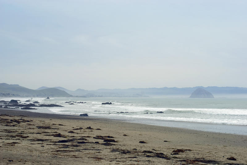 view towards morro bay including morro rock in the distance, california central coast