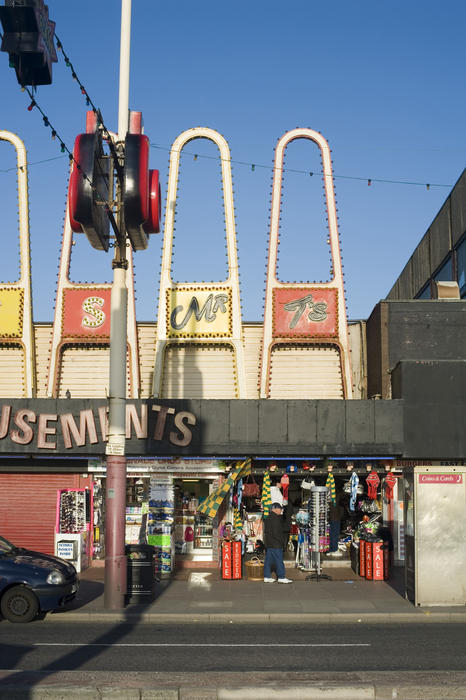 View across an urban street to the front facade of the Blackpool amusement arcades